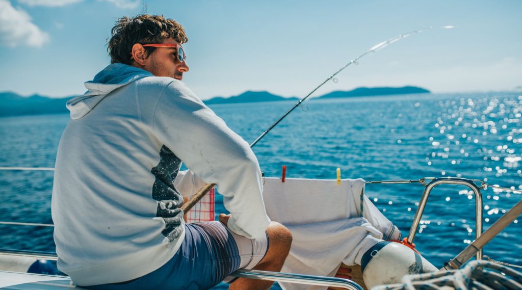 Man fishing on a boat