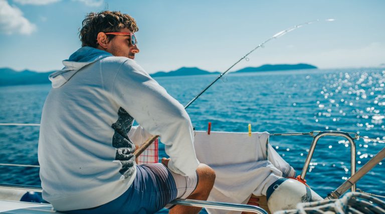 Man fishing on a boat