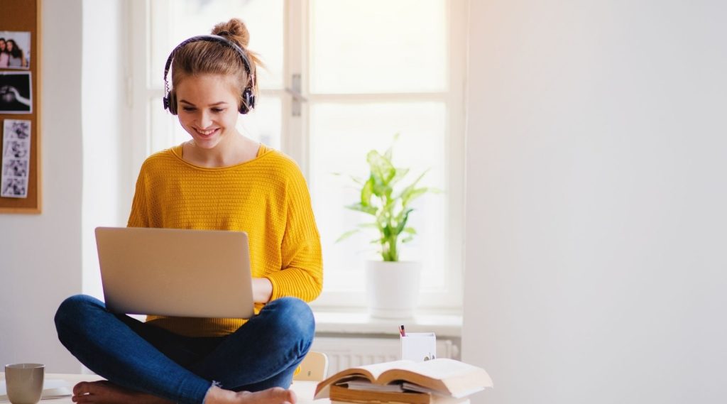 Young woman using her laptop
