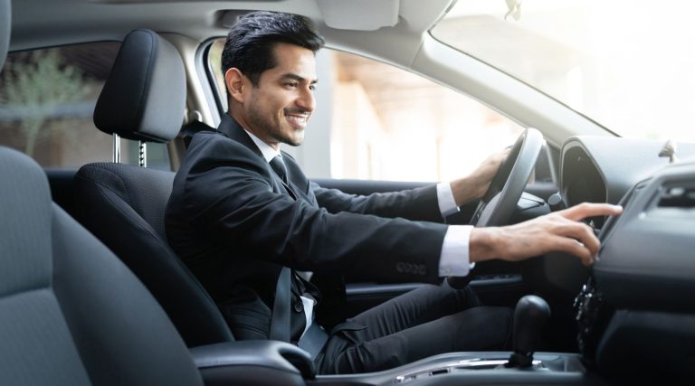 Businessman driving car