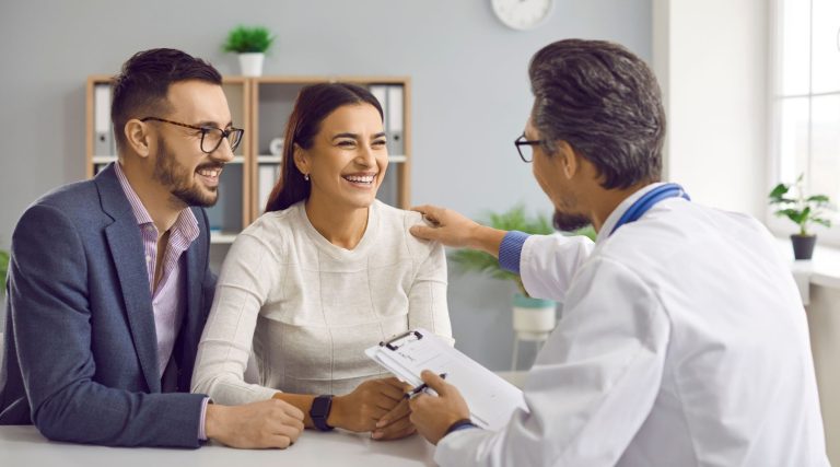 Couple speaking to the doctor