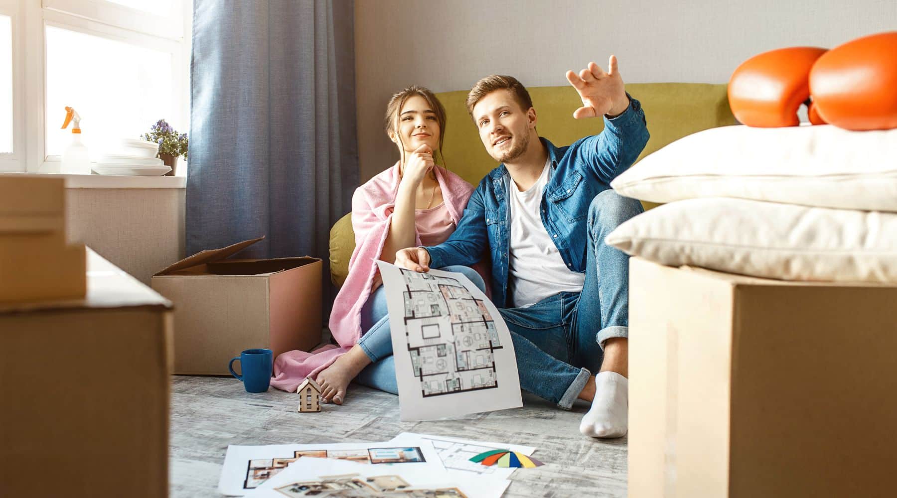 Young couple planning interior of their new home