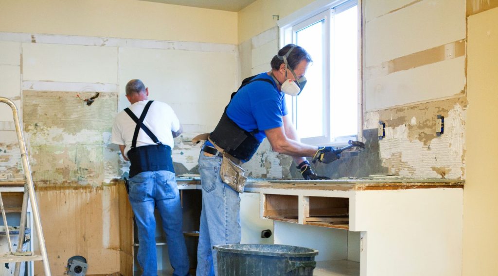 Tradies renovating a kitchen
