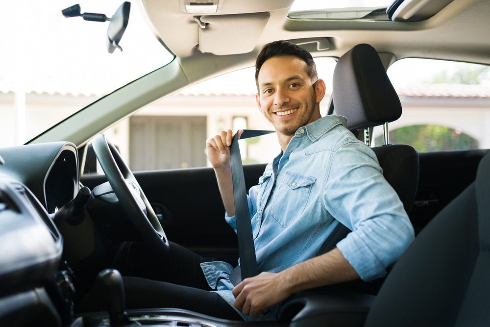 Man preparing to drive his car