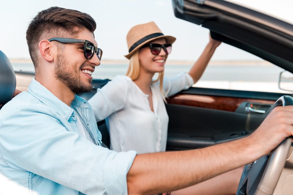 Couple driving in car