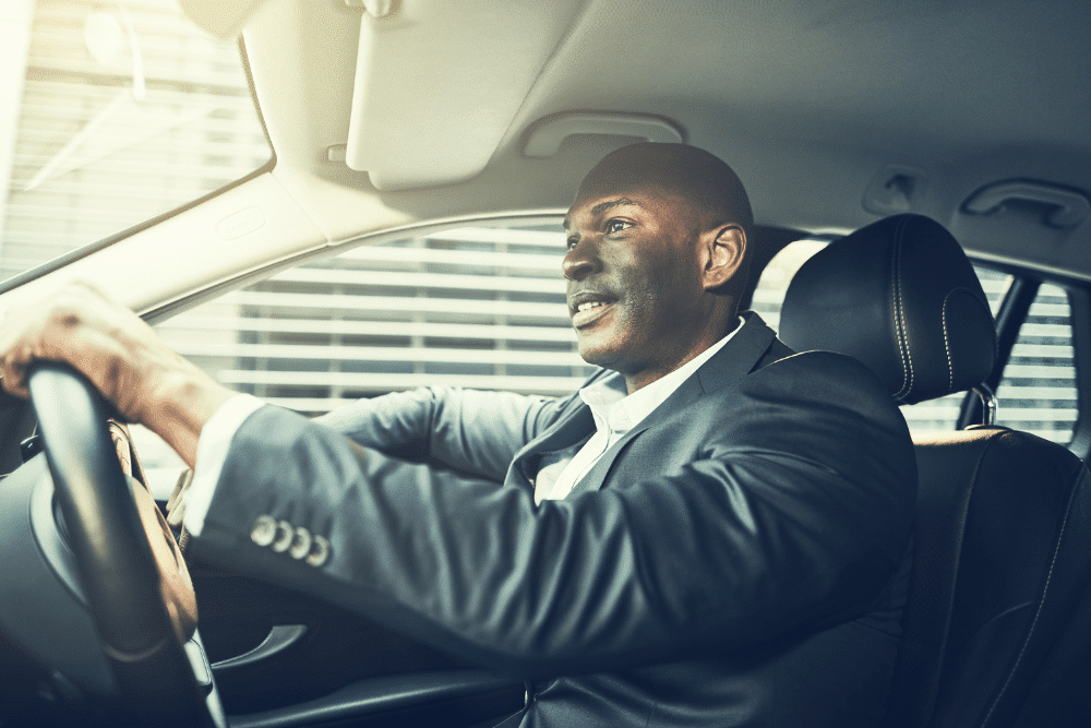 Businessman driving his car
