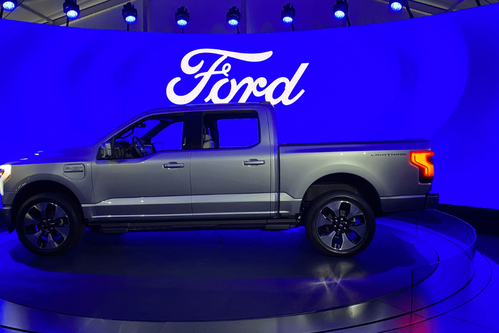 Grey Ford F-150 Lightning electric ute side view.