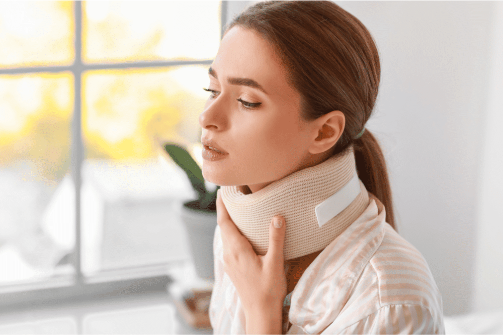 Woman wearing a neck brace
